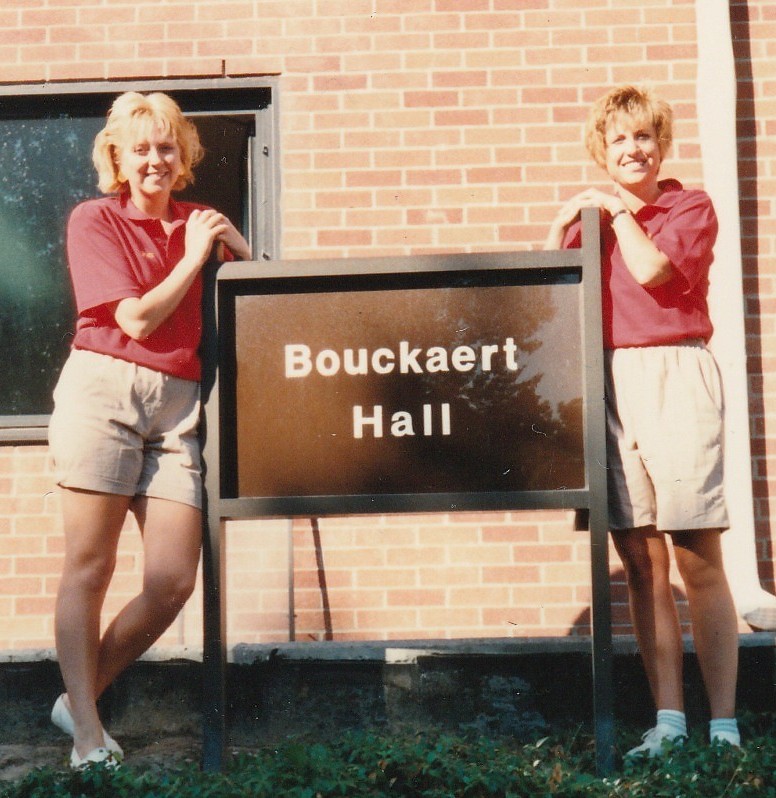 Patricia and a fellow don in front of Bouckaert Hall